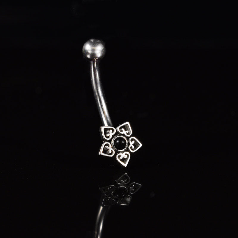 curved barbell in steel with filigree design black onyx stone