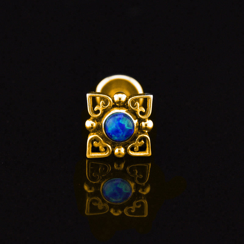 gold colour labret with heart filigree and deep lue opal stone