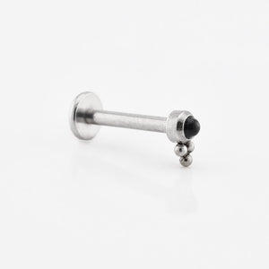tribal labret piercing with black onyx stone and triple beads