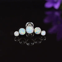 helix earring, labret with 5 opal stones on a black background
