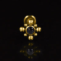 Gold steel internally threaded labret with tribal beading and black onyx stone
