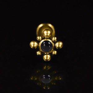 Gold steel internally threaded labret with tribal beading and black onyx stone