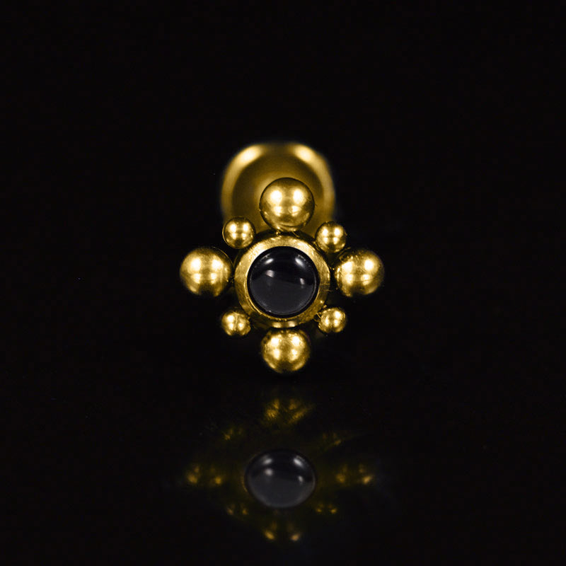 Gold steel internally threaded labret with tribal beading and black onyx stone