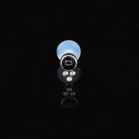A BioFlex Labret with Onyx Stone and Triple Dots on a black background, primarily showcasing the labret with the stone.