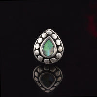 silver teardrop labret piercing stud with abalone and tribal dots
