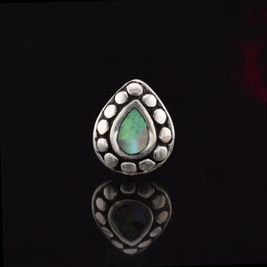 silver teardrop labret piercing stud with abalone and tribal dots
