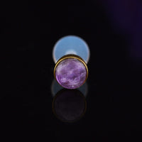 Amethyst Labret, gold steel on a ptfe bioflex bar on a black background