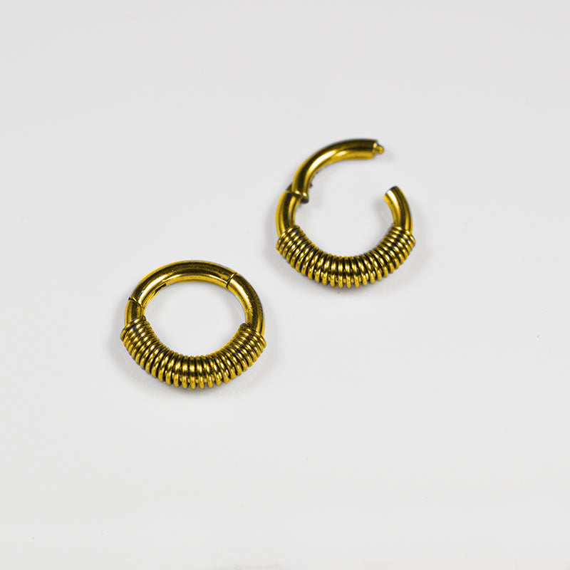very small hinged segment ring in gold pvd 