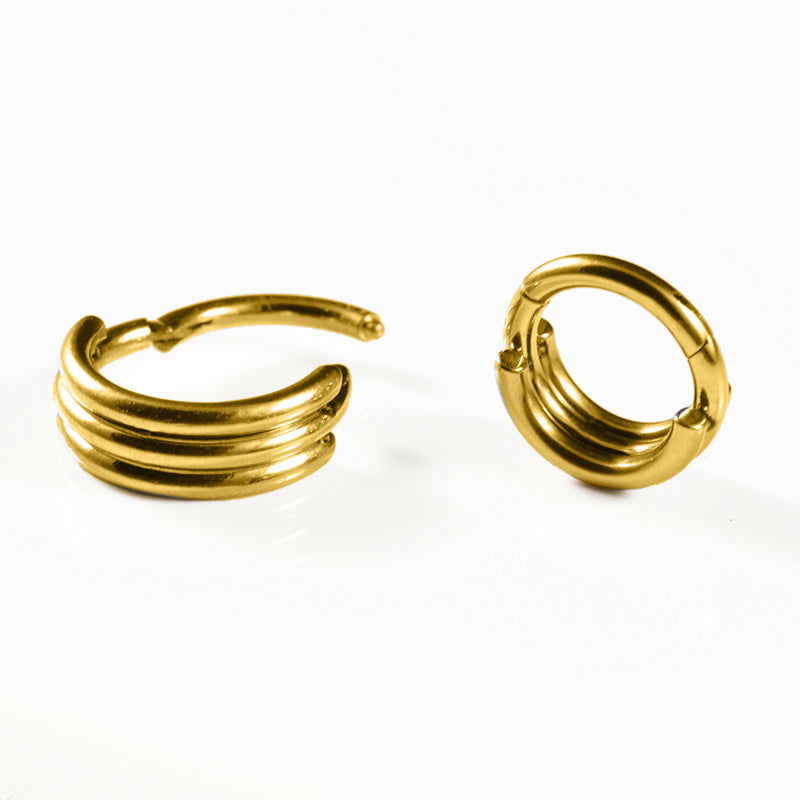 hinged segment clickers in gold steel with triple bars