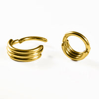 hinged segment clickers in gold steel with triple bars