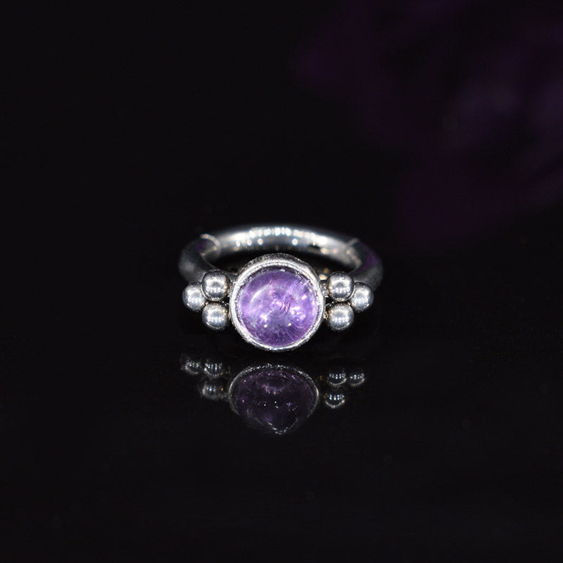 clicker ring with amethyst crystal