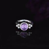 clicker ring with amethyst crystal