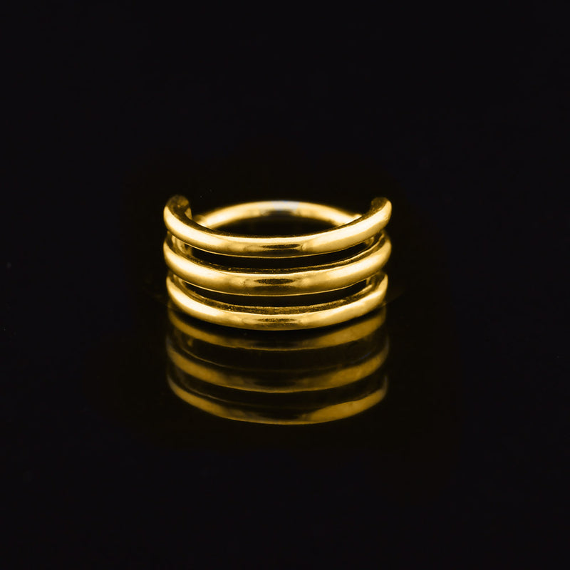triple hoop segment clicker ring in gold steel