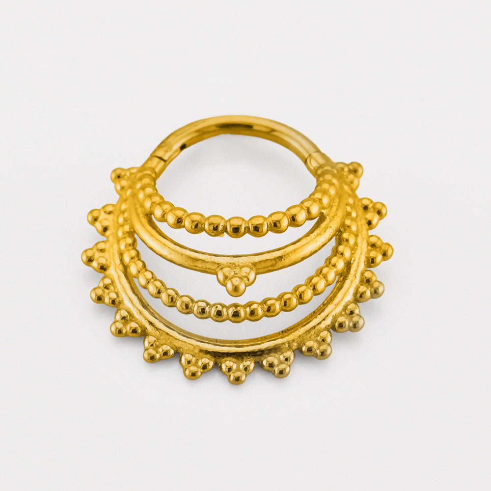 Tribal Indian style hinged segment clicker ring in gold surgical steel