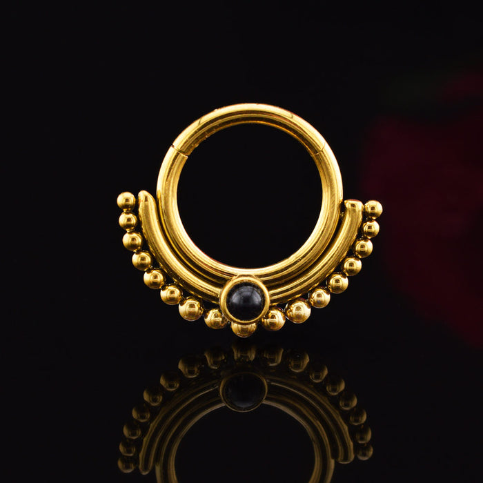 tribal indian hinged segment clicker ring in gold steel with black onyx stone
