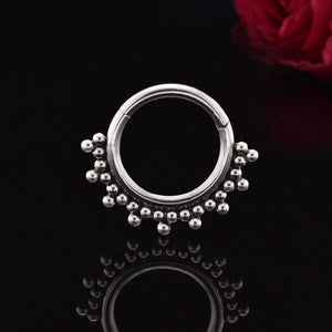 tribal beads clicker ring on black bacground