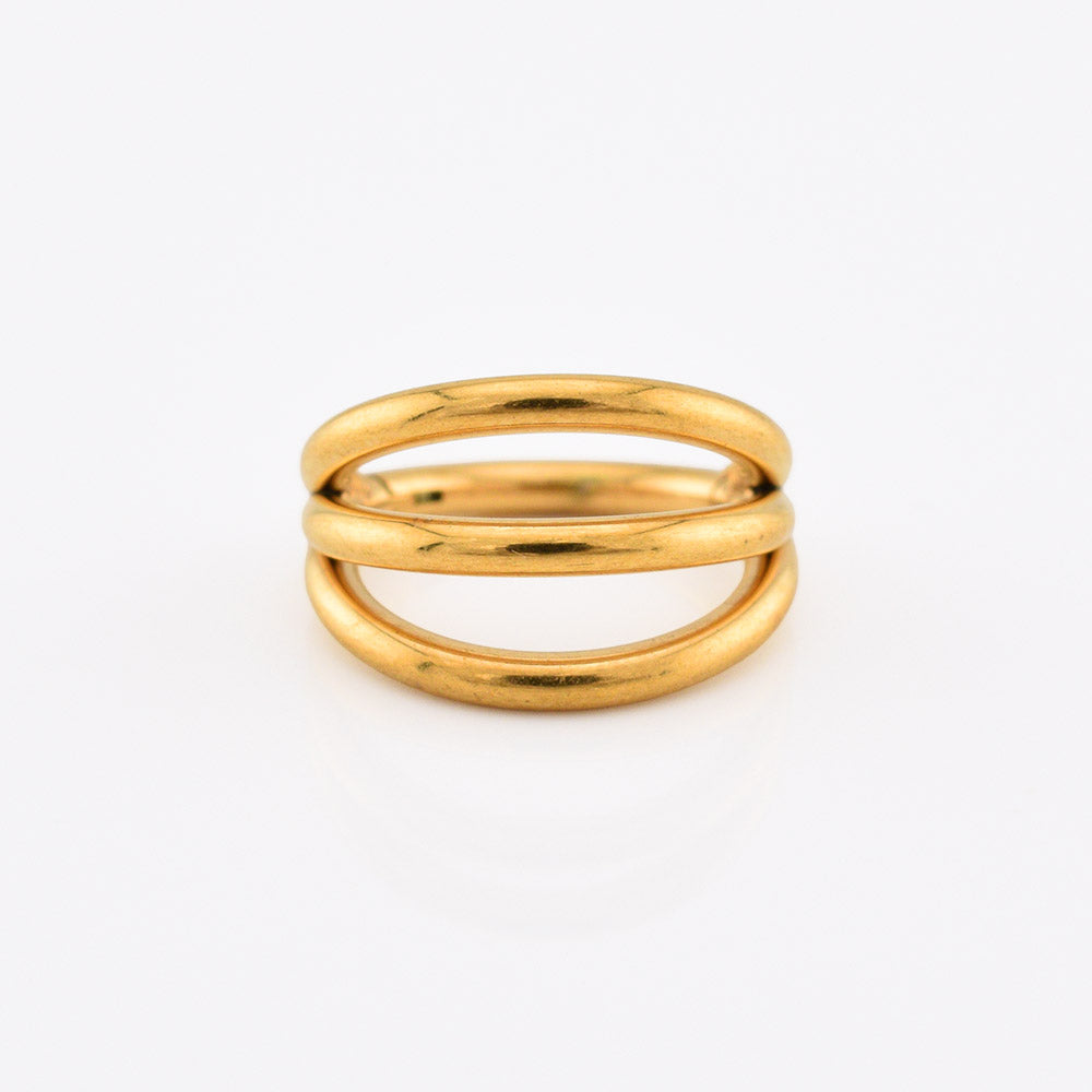 A gold triple band clicker ring with a polished, rounded design, photographed on a clean white background.