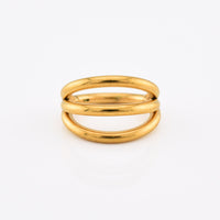 A gold triple band clicker ring with a polished, rounded design, photographed on a clean white background.