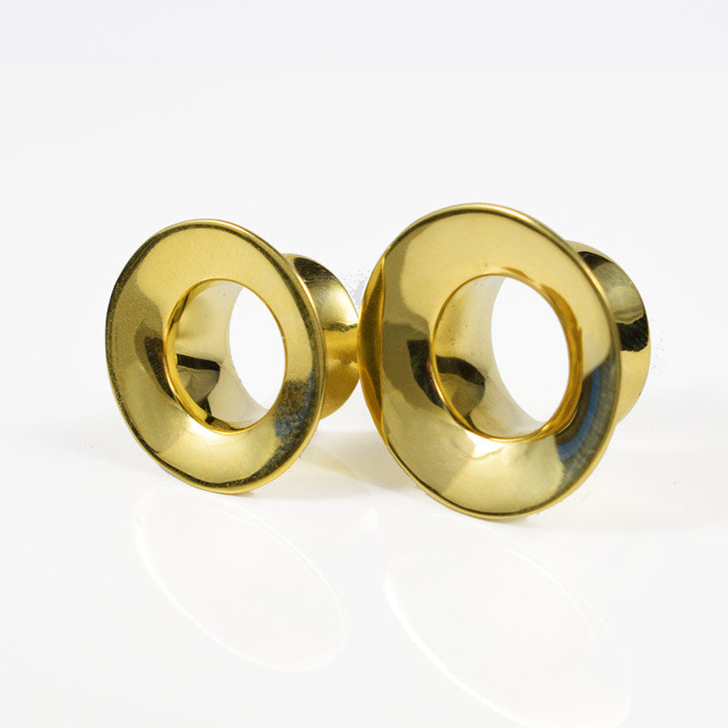 traditional tribal ear tunnels in brass
