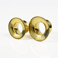 traditional tribal ear tunnels in brass