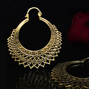 large ethnic hoop earrings in brass