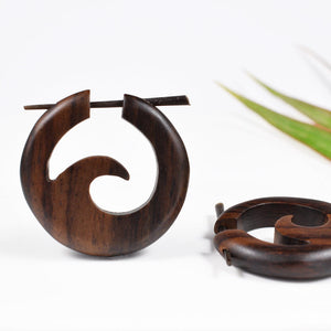 wooden stick earrings with wave in a circle