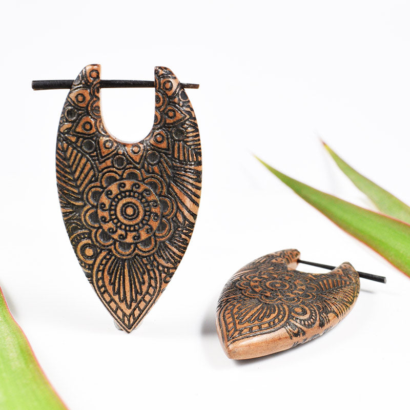 Wooden stick earrings with tribal flower and leaf engraving