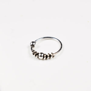 silver nose ring with coil design
