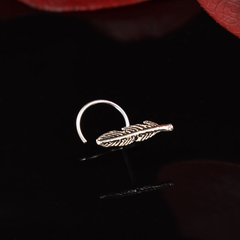 Silver feather nose stud