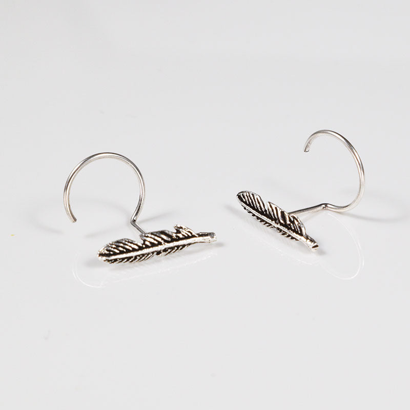 Silver feather nose studs