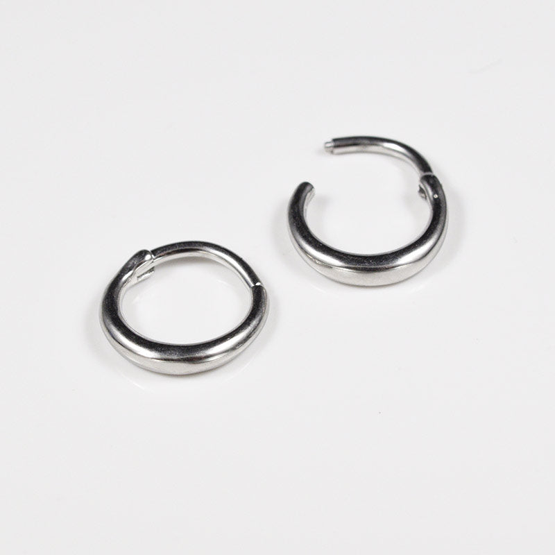Hinged outlet septum ring