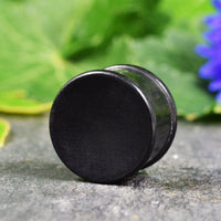 Black wood flesh plugs